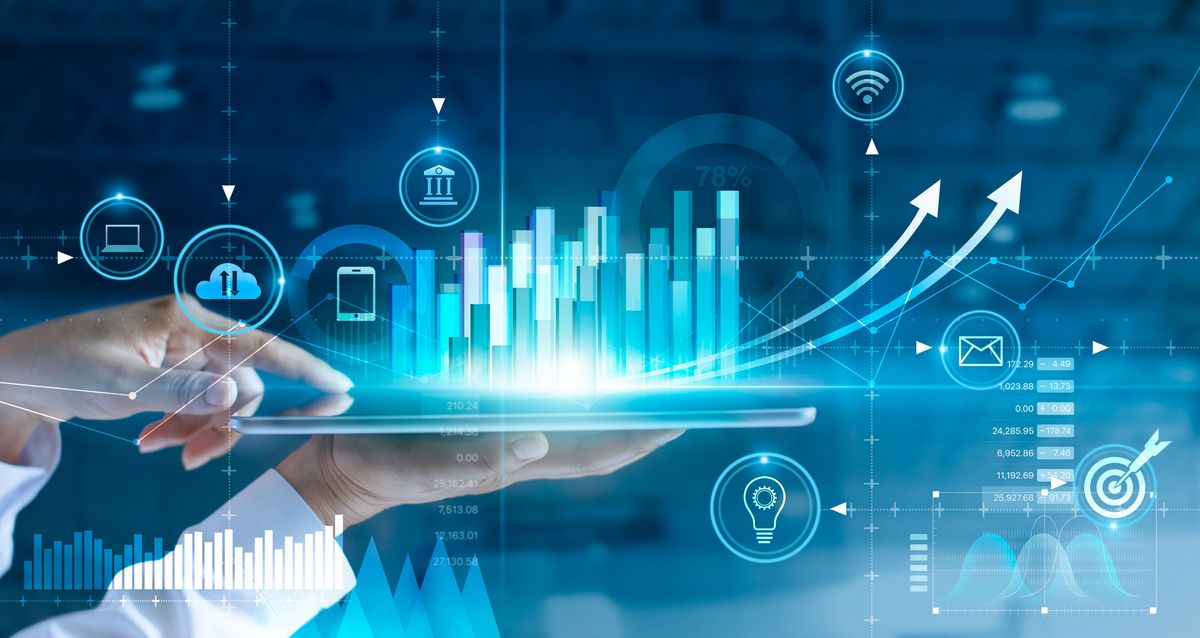 Businessman using tablet analyzing sales data and economic growth graph chart. Business strategy. Abstract icon. Digital marketing. Businessman using tablet analyzing sales data and economic growth graph chart. Business strategy. Abstract icon. Digital marketing.