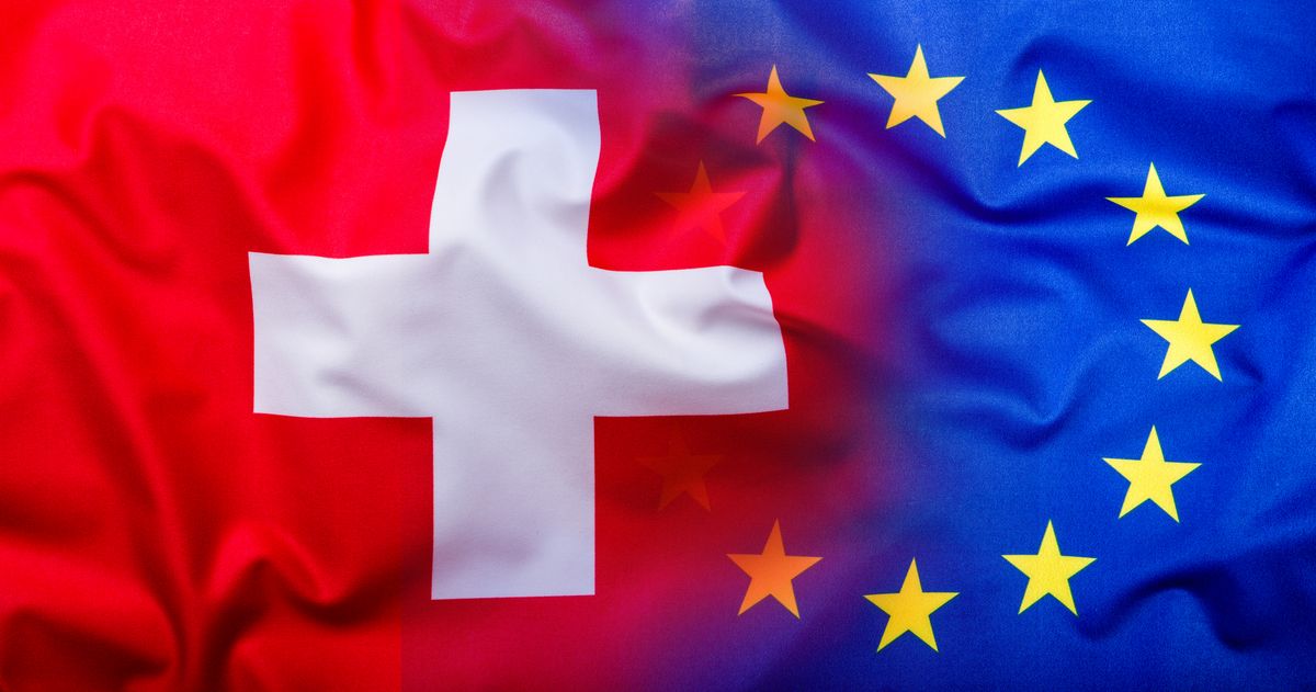 Flags of the Switzerland and the European Union.Flag money concept Flags of the Switzerland and the European Union.Flag money concept